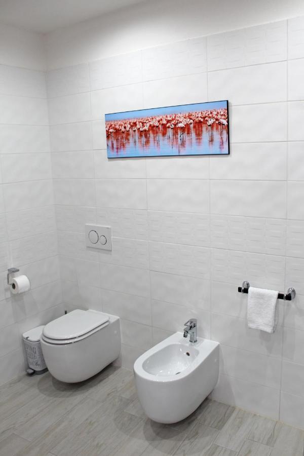 Flamingo Luxury Apartment Ajpsardinia Кальяри Экстерьер фото